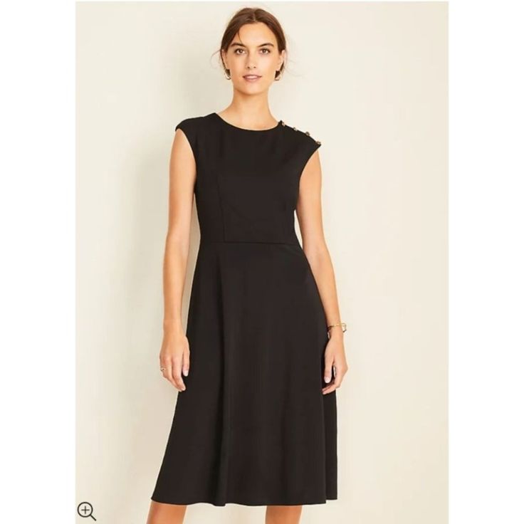 Ann Taylor Shoulder Button Matte Jersey Flare Dress New With Tags Size Large Black Polyester And Spandex A Modern Feminine Dress Essential From Office To Evening, Our Matte Jersey Flare Dress Tops It Off With Polished Shoulder Button Detail. Jewel Neck. Cap Sleeves. Shoulder Button Placket. Hidden Back Zipper With Hook-And-Eye Closure. Lined Bodice. Perfect For Cocktails, Party, Dinner Date, Office, Night Out, Special Occasions The Color May Vary Due To Lighting On My Device, Your Device Or Othe Fitted Button Back Midi Dress For Work, Fitted Midi Dress With Button Back For Work, Classic Dresses For Workwear With Button Back, Classic Dresses For Work With Button Back, Fitted Dress With Button Back For Work, Classic Button Back Dress For Work, Classic Workwear Dress With Button Back, Black Button-back Dress For Work, Black Workwear Dress With Button Back