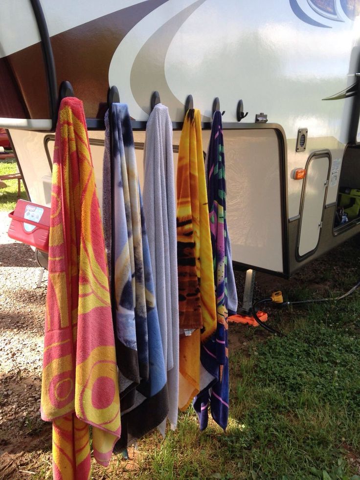 towels hanging from the back of an rv