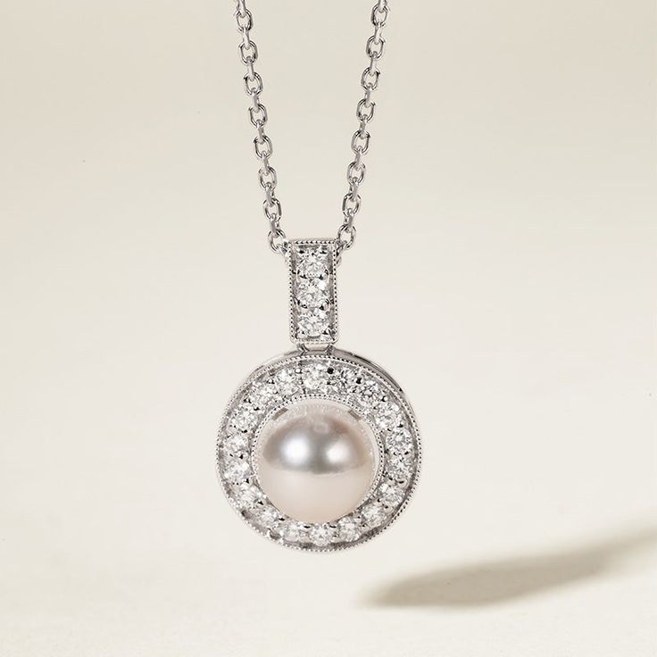 Experience Timeless Elegance with Akoya Pearls Material: Akoya Pearl, 18K white gold and diamond (S925 Silver Chain) Akoya pearl saltwater cultured pearl 1 pearl 6.5-7.0mm 21 diamonds about 0.315 carats in total Size of Pendant: 12.0*18.5 mm Handpicked of every pearl, only the top 1% of pearls are selected Handcrafted Lifetime warranty Classic Pearl Charm Jewelry For Anniversary, Classic Jewelry With Pearl Charm For Anniversary, Elegant Oval Sterling Silver Pearl Necklace, Classic Round Pearl Charm Jewelry, Classic Pearl Necklace With Pearl Pendant For Anniversary, Classic Pearl Pendant Necklace For Anniversary, Exquisite Pearl Chain Necklace For Anniversary, Timeless Pearl Necklace With Pearl Charm For Formal Occasions, Classic Round Jewelry With Pearl Charm