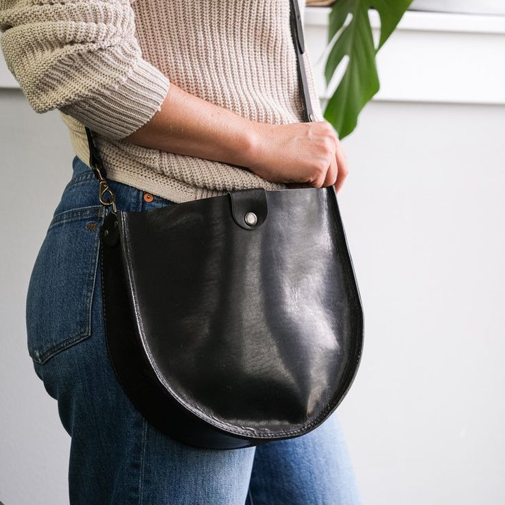 Leather Crossbody Saddle Bag Monogram Purse Leather | Etsy Versatile Bucket Bag With Magnetic Closure For Everyday Use, Versatile Everyday Bucket Bag With Magnetic Closure, Classic Soft Leather Saddle Bag For On-the-go, Leather Crossbody Bucket Bag With Magnetic Closure, Classic Hobo Bag With Snap Closure For Everyday, Versatile Everyday Bags With Magnetic Closure, Versatile Everyday Bag With Magnetic Closure, Modern Everyday Bucket Bag With Magnetic Closure, Classic Everyday Crossbody Saddle Bag