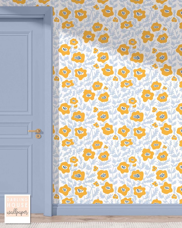 an open door in front of a floral wallpapered room with yellow and blue flowers