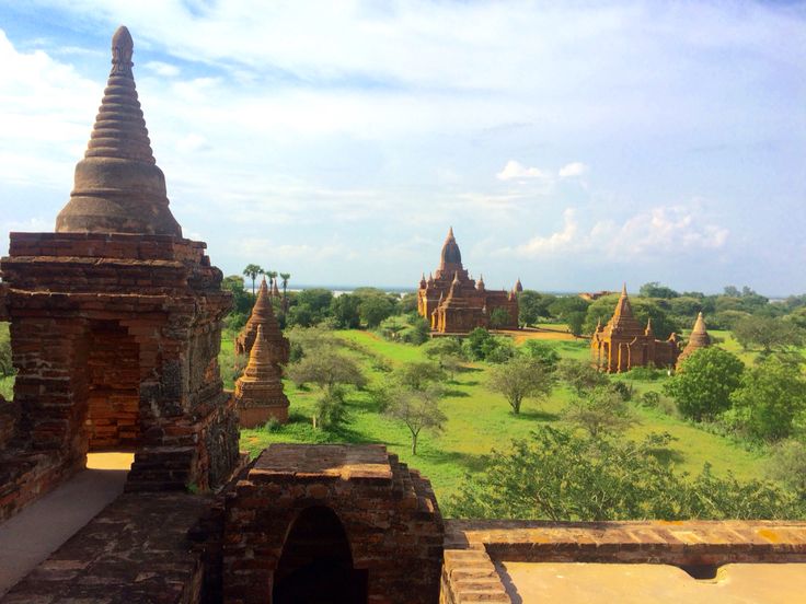 an aerial view of the temples in bagan, myanmar with trees and green fields