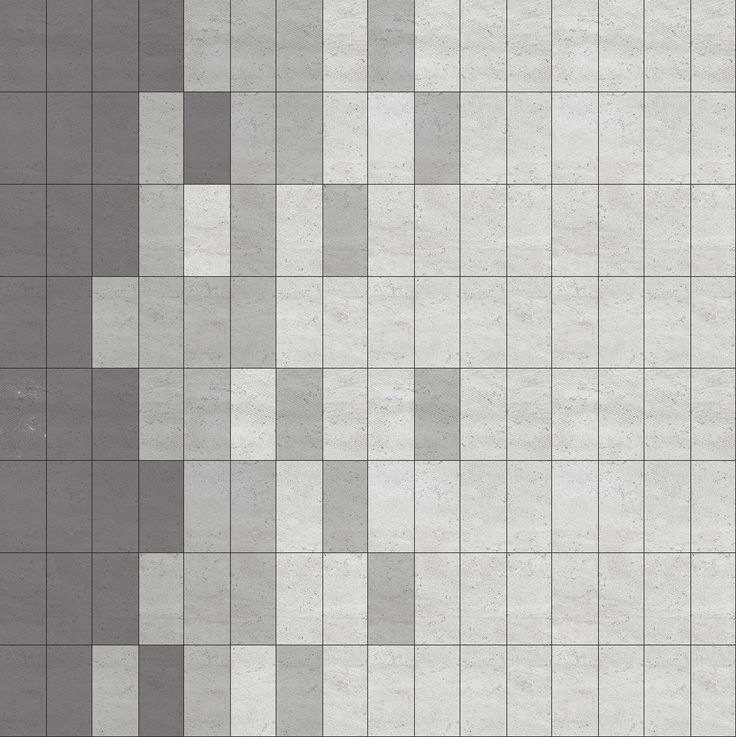 a gray and white tiled wall with squares on the bottom, as well as lines in the middle