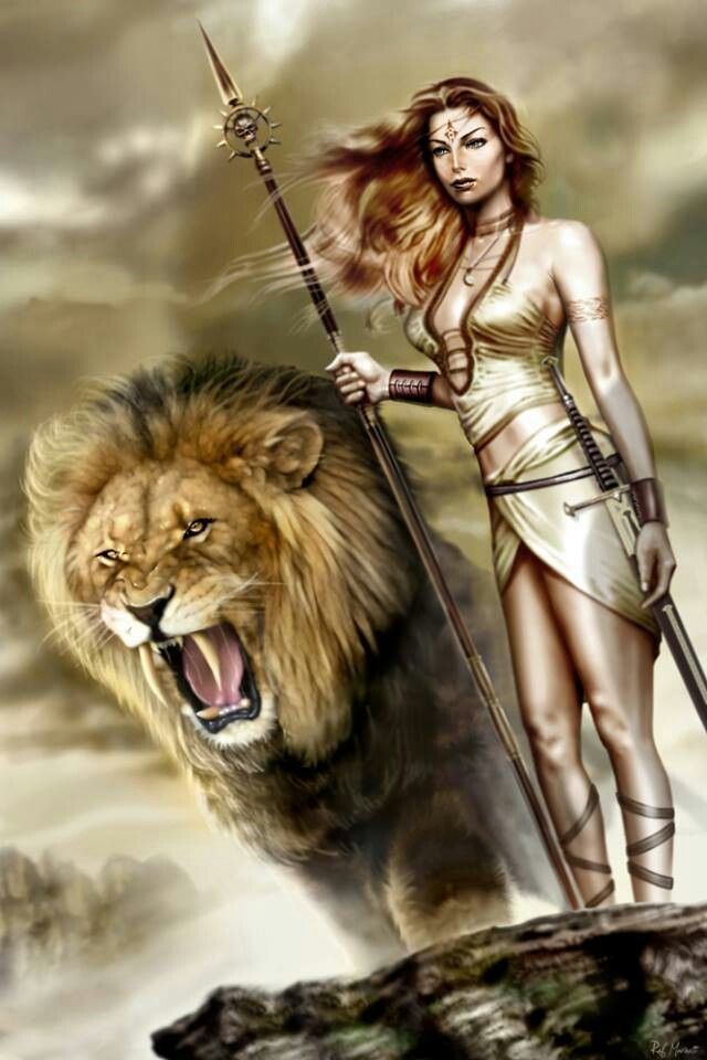 a beautiful woman holding a spear and standing next to a large lion on top of a hill