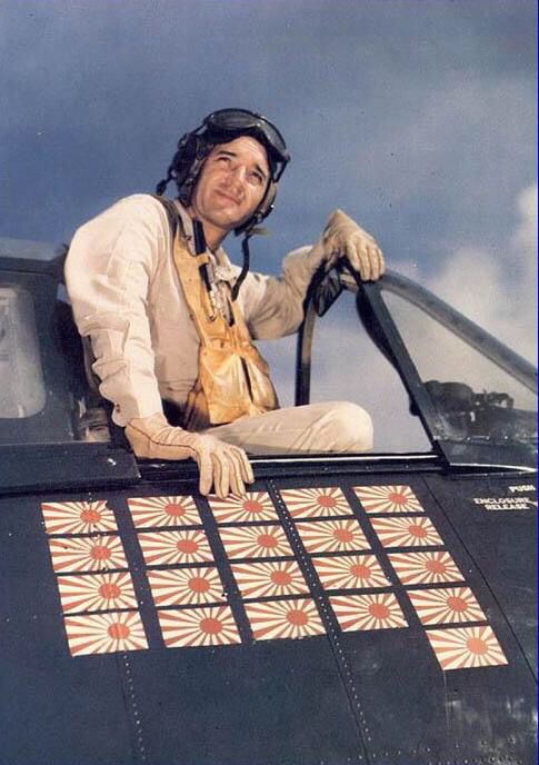 a man sitting in the cockpit of an airplane