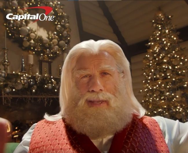 an old man with white hair and beard in front of christmas trees wearing a red vest