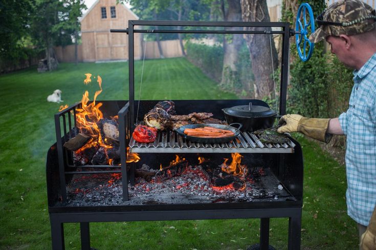 a man grilling food on an outdoor bbq