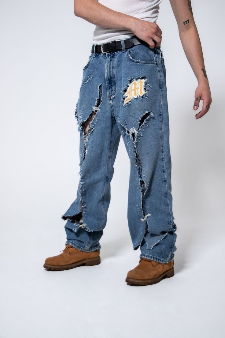 Mediums 1of1 Familia light blue distressed jeans - 36/30 Streetwear Frayed Hem Flare Jeans In Medium Wash, Streetwear Medium Wash Flare Jeans With Frayed Hem, Ripped Light Wash Rigid Denim Flare Jeans, Ripped Light Wash Flare Jeans In Rigid Denim, Blue Deconstructed Rigid Denim Jeans, Blue Rigid Denim Deconstructed Jeans, Faded Ripped Rigid Denim Jeans, Urban Style Ripped Recycled Denim Bottoms, Faded Ripped Jeans In Rigid Denim