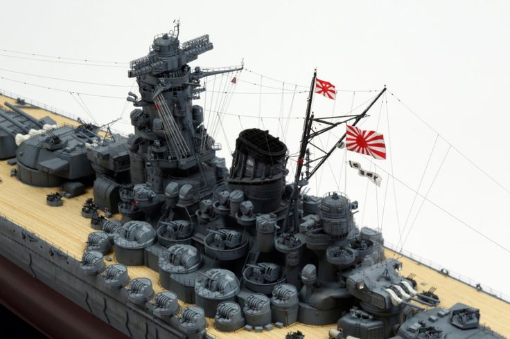 a model of a battleship is shown on a table