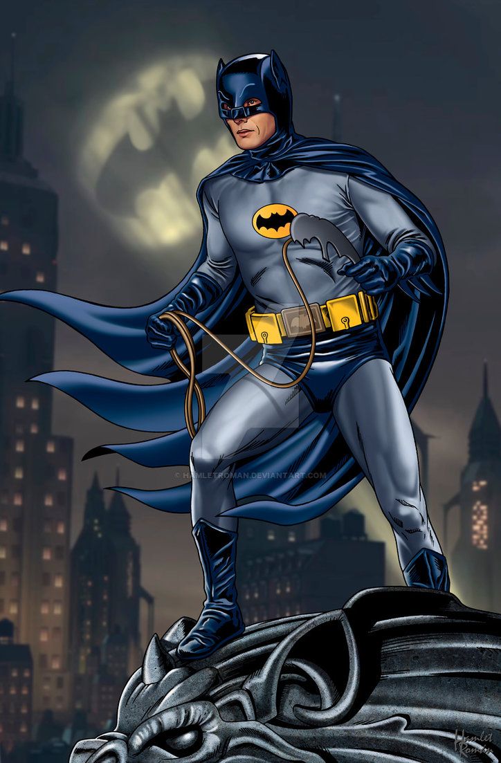 batman standing on top of a statue in front of a cityscape at night