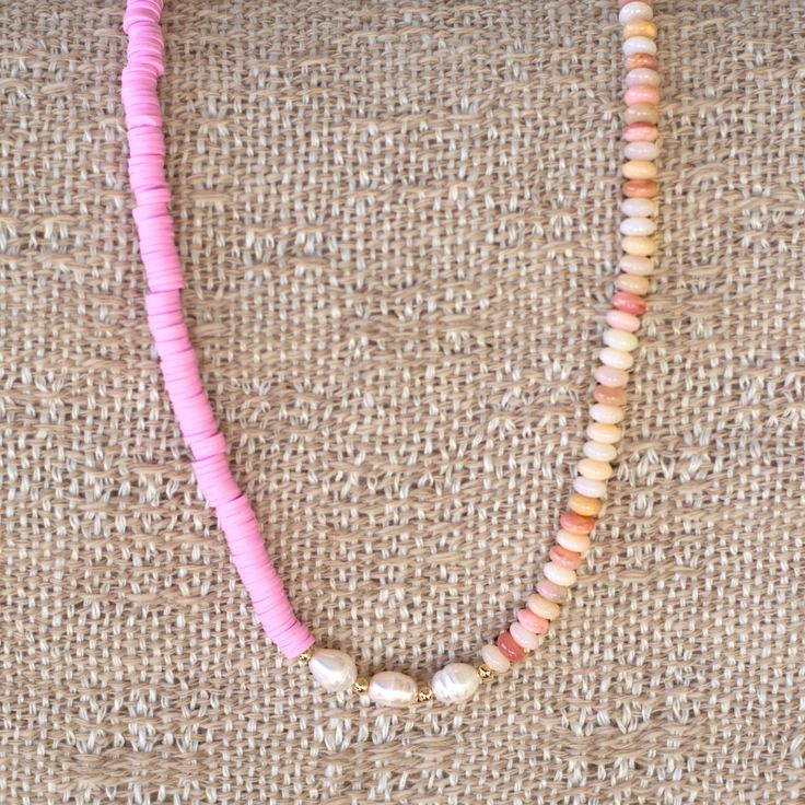 Beautiful and chic, the Azalea necklace features multi color opal gemstones, baroque pearls, and pink clay beads. She can be worn day or night and will make you feel so pretty when wearing her. Length: 16" with extender Pink Single Strand Bohemian Beaded Necklaces, Pink Bohemian Single Strand Beaded Necklaces, Bohemian Pink Single Strand Beaded Necklaces, Pink Heishi Beads Necklace With Tiny Beads, Pink Heishi Beads Necklace, Pink Heishi Beads Necklace For Gift, Handmade Pink Heishi Beads Necklace, Pink Shell Necklace With Round Beads, Adjustable Pink Pearl Necklace With Colorful Beads