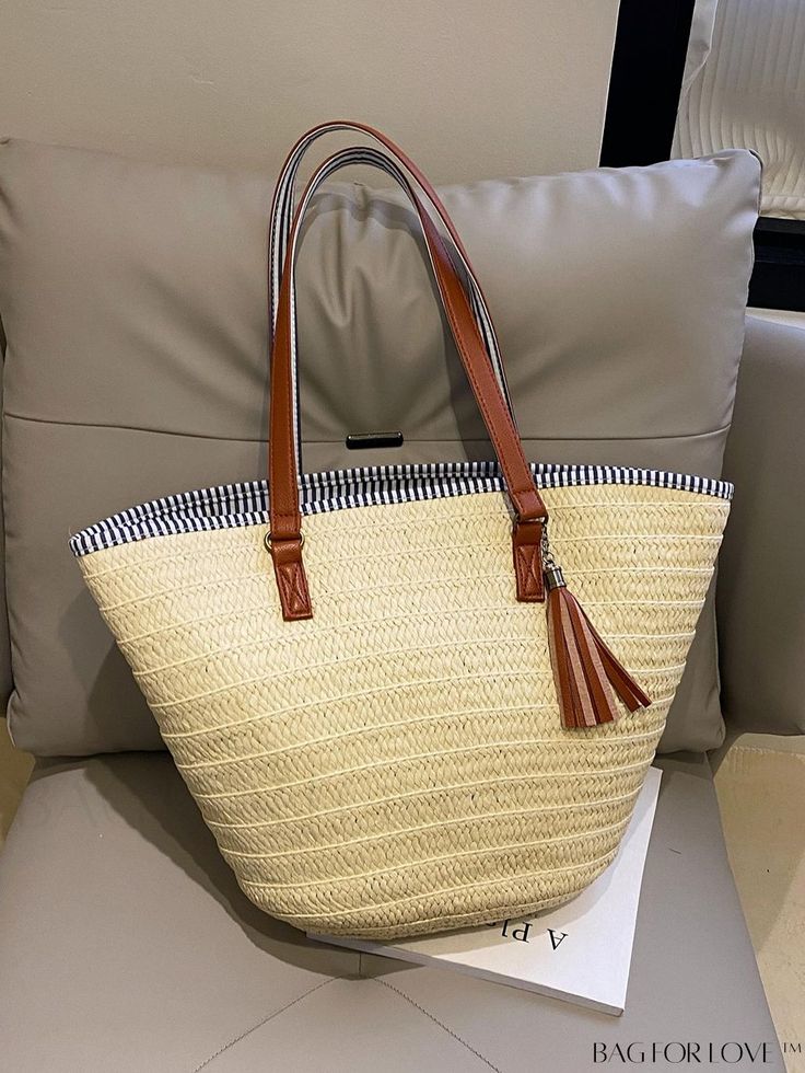 BagForLove - Oversized Minimalist Straw Bag with Tassel Decor - Perfect for Vacation Product Description Color Beige Strap Type Double Handle Pattern Type Striped Type Straw Bag Bag Size Oversized Closure Type Zipper Material PP Size Chart INCH CM Bag Length Bag Width Bag Height Handle Height 19.3 inch 6.3 inch 11.8 inch 10.2 inch Bag Length Bag Width Bag Height Handle Height 49 cm 16 cm 30 cm 26 cm Details Pictures Similar Products h2 { text-align: center; } /* æ¢è¡ */ li{ white-space: normal; word-break: break-all; word-wrap: break-word; } .red-box { width: 100%; display: flex; flex-direction: row; flex-wrap: wrap; justify-content: center; } .red-box > div { width: 190px; height: 250px; margin: 10px; } .red-box > div > a > img { width: 190px; height: 250px; } .size-box { width: 100%; m Casual Beige Beach Bag With Tassels, Beige Bucket Bag With Tassels For Daily Use, Beige Tassel Bucket Bag For Daily Use, Casual Spring Bags With Fringe, Casual Fringe Bags For Spring, Spring Beige Shoulder Bag With Tassels, Casual White Shoulder Bag With Tassels, Summer Bucket Bag With Tassels For Everyday Use, Spring Travel Bag With Tassels