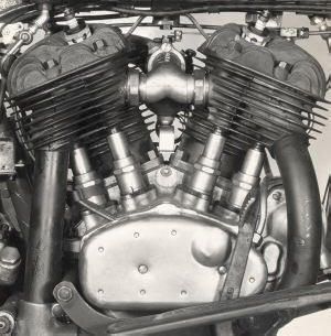 an old motorcycle engine is shown in black and white