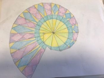 a drawing of a colorful umbrella on a piece of paper