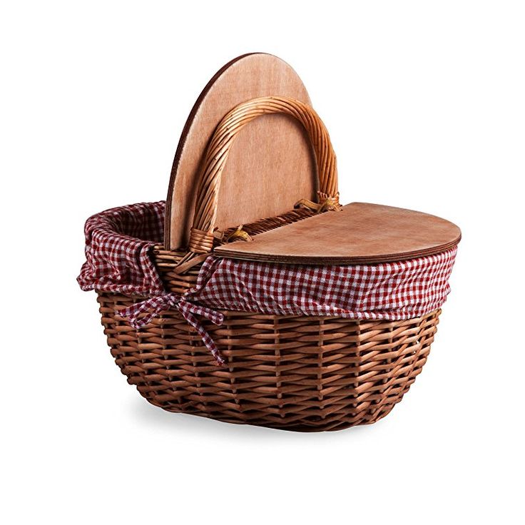 a wicker basket with a wooden heart shaped plate in the center and a red checkered bow