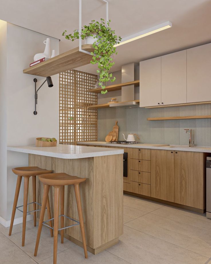 a kitchen with two stools next to a counter top and an island in the middle