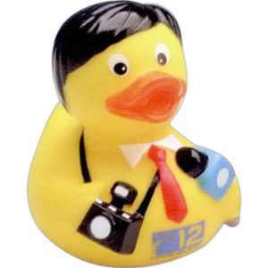 a rubber duck with a camera on it's chest and necktie is shown