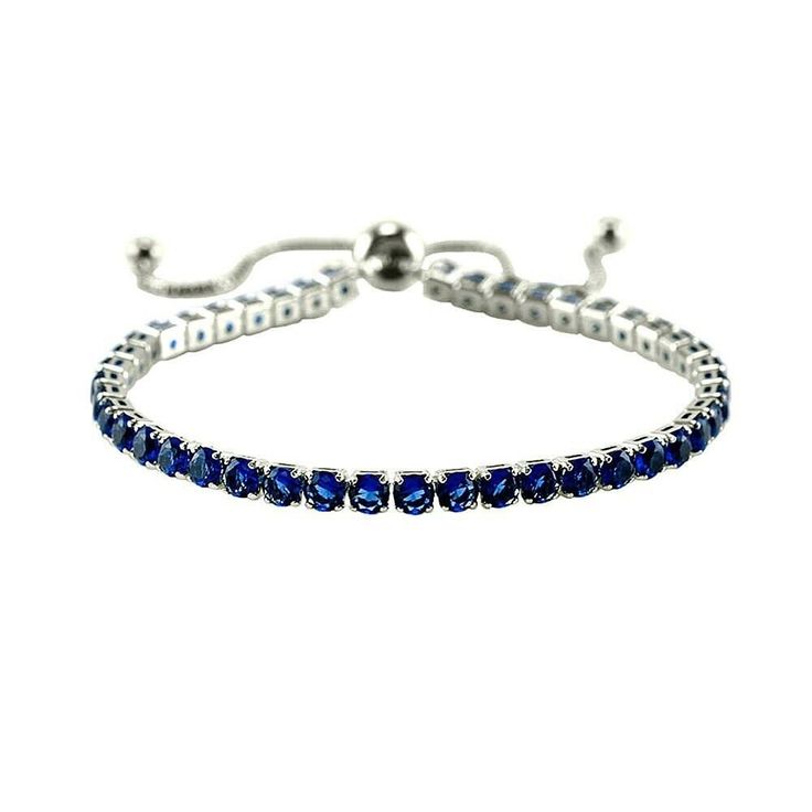 Round Blue Sapphire CZ Cubic Bolo Tennis Bracelet-SZ-ADJ+Good 4 Kid  The gorgeous CZ stones are hand-set. A perfect choice to declare your statement style for everyone to see BOLO BRACELETS ARE HOT..ANY 1 CAN WEAR THEM. CUTE FOR MOMMY AND ME Stack them up and mix colors HOT AND NEW STYLE..ONE SIZE FITS ALL Fits Kids Also Bracelet Width: 4 mm Stone: Blue Sapphire, CZ Style: Bolo Tennis Category:Bracelet Base Material: Nickle free,Lead free Stone Type:Cubic Zirconia Plating: Rhodium Plated NEVER BUY A DIAMOND AGAIN Base Material: Brass,USA Lead & Nickle Free Compliant Plating: Thick + Heavy Plating, Shiny High Polished Rhodium & Gold  Plated designs The Stones Are The Same Used In Gold Or Silver 925 Jewelry. All items are shipped in a box, bubble wrap envelope and sent USPS 1st class mail. I Adjustable Sapphire Crystal Bracelet, Adjustable Blue Tennis Bracelet, Adjustable Blue Round Tennis Bracelet, Adjustable Sapphire Bracelet Jewelry, Blue Bracelets With Adjustable Chain, Adjustable Blue Crystal Round Bracelet, Adjustable Blue Crystal Bracelet, Eternity Bracelet, Pearl Cream