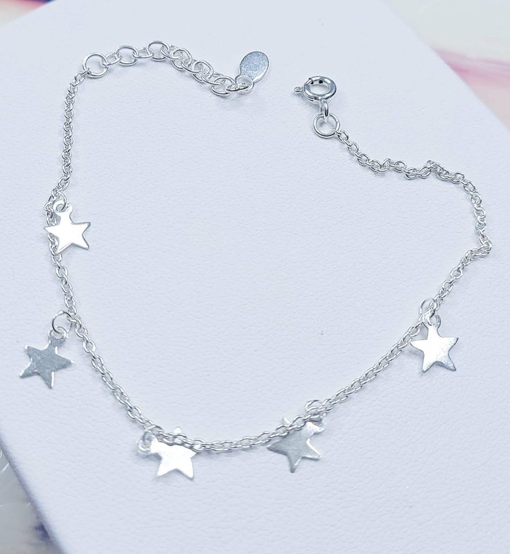 .925 Sterling Silver Our Jewelry are made with the best quality Genuine Sterling Silver. Our designs are unique, beautiful y never go out of style. Dainty Sterling Silver Bracelet With Star Charm, Nickel-free Sterling Silver Trendy Bracelets, Trendy Nickel-free Sterling Silver Bracelets, Gift Chain Bracelet With Star Charm, Trendy Hypoallergenic Sterling Silver Bracelets, Elegant Adjustable Charm Bracelet With Star Charm, Trendy Silver Star Bracelet, Elegant Sterling Silver Star Bracelet, Dainty Sterling Silver Dangle Bracelets