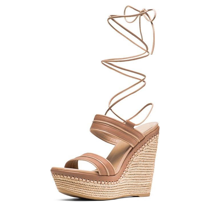 Elevate your style with these Tan Strappy Platform Heels. Perfect for summer, these open-toe wedge sandals offer both fashion and comfort, ideal for any warm-weather ensemble. Color: Tan Heel Type: Wedge heel Heel Height: 6.3" / 160 mm approx Product measurements were taken using size 8. Please note that measurements may vary by size. Toe: Open toe With platform Ankle lace-up design Handcrafted US sizing. Fits true to size. Summer Beach Lace-up Wedge Sandals, Chic Closed Toe Lace-up Sandals For Summer, Chic Summer Platform Lace-up Sandals, High Heel Summer Wedge Sandals, Summer High Heel Wedge Sandals, Trendy Beige Closed Toe Wedge Sandals, Chic Lace-up Wedge Heel Sandals For Spring, Platform Wedge Sandals For Beach Season, Summer High Heel Platform Lace-up Sandals