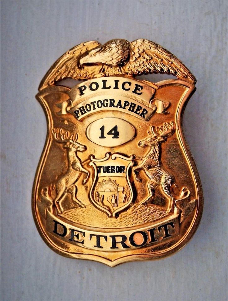 a police badge on the side of a building