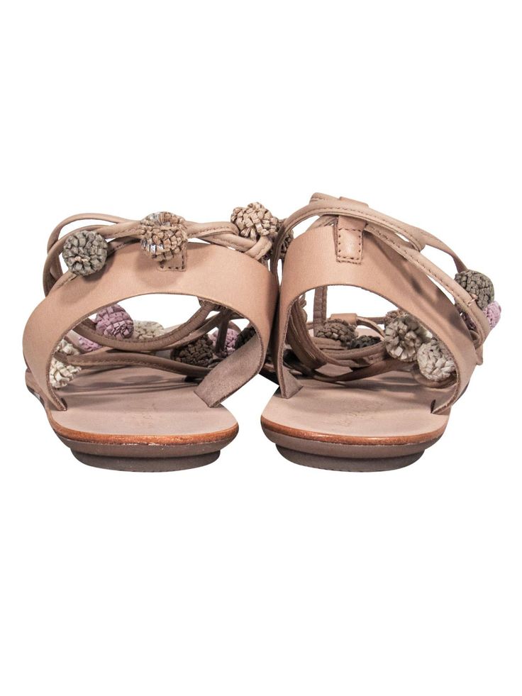 Elevate your boho look this summer with these sandals from Loeffler Randall! These strappy sandals feature adorable baubles and are perfect for any casual outing or even a music festival! Pair with a sundress and hobo bag for a hippie chic look. Size 7 Leather upper w/ strappy design Pink, green, tan and white baubles on straps Slip on closure w/ ties Leather sole and footbed w/ minor wear on toes Original dustbag included Length 9.5" Casual Toe Ring Sandals With Adjustable Strap, Casual Toe Ring Sandals With Adjustable Strap For Beach, Casual Beach Toe Ring Sandals With Adjustable Strap, Spring Vacation Toe Ring Sandals With Adjustable Strap, Bohemian Summer Party Sandals, Bohemian Open Toe Sandals For Party, Trendy Open Heel Lace-up Sandals For Vacation, Trendy Lace-up Sandals With Open Heel For Vacation, Adjustable Lace-up Sandals With Open Heel For Vacation