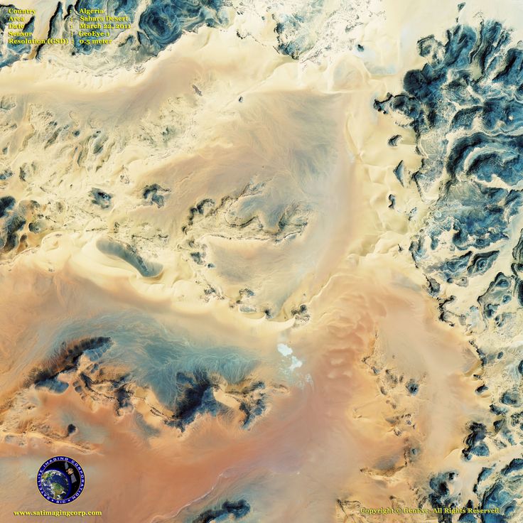 an aerial view of the mountains and valleys in the desert, with blue circles on them