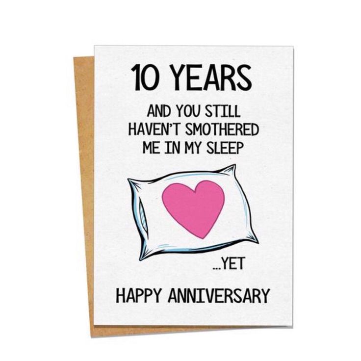 an anniversary card with the words 10 years and you still haven't smothered me in my sleep