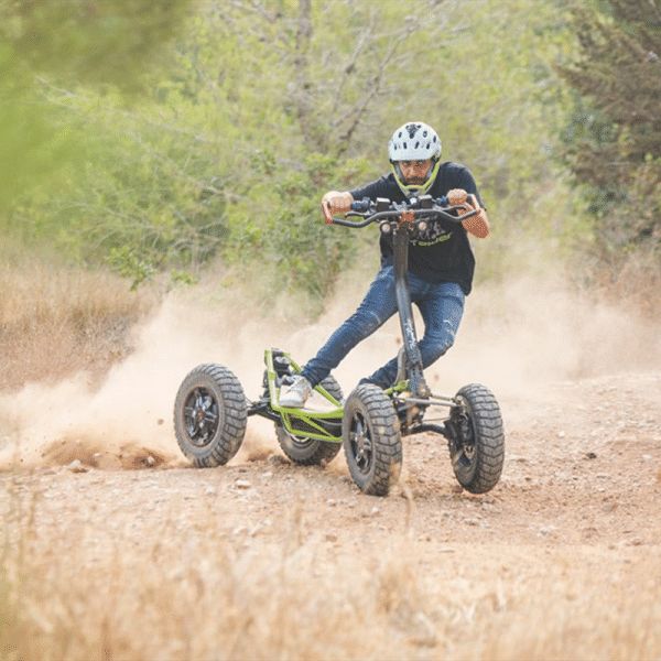 a man riding on the back of an off road buggy