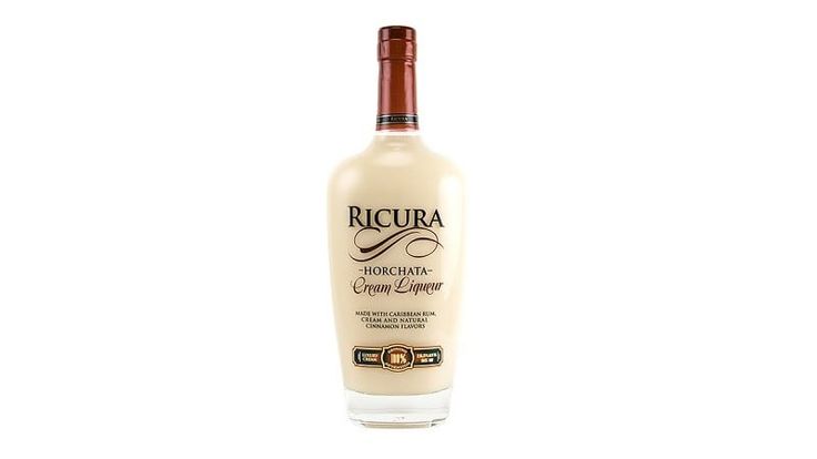 a bottle of hair care product on a white background with the words ricoura written in it