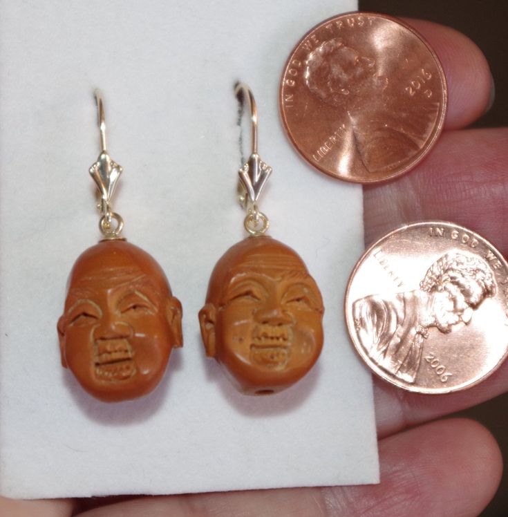 Absolutely spectacular antique arhat Buddha carved from olive pit prayer beads Measuring approximately 19 inches in length, the circumference around Each individually carved Buddha is differently carved with very intricate face A fabulous find from an estate sale in St. Louis, MO These prayer beads are a very unique and rare find I made these earrings from matched Buddha faces with 14k lever backs Unique, high polish, beautiful You will love weraing them. Traditional Brown Carved Jewelry, Antique Brown Carved Jewelry, Brown Carved Spiritual Jewelry, Spiritual Brown Carved Jewelry, Coral Roses, Buddha Face, How Lucky Am I, Coral Ring, Leverback Earrings