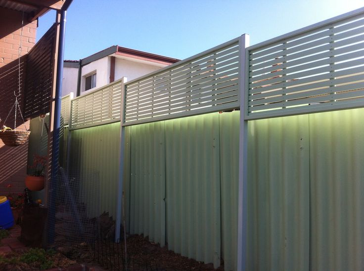 a fence that is next to a house