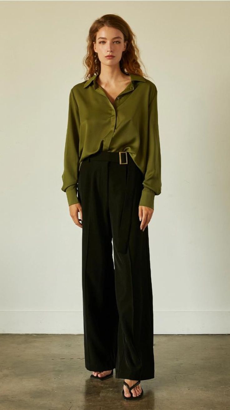 Experience comfort and sophistication in the Olive Blouse. Expertly crafted with a blend of 98% polyester and 2% spandex, this satin blouse features an open back detail, hidden button front closure, long sleeve, button closure cuffs, and a flowy fit. Perfect for Fall/Winter, this timeless blouse will elevate your wardrobe. Details:Model is wearing size smallWeight: 3 lb (1.4 kg) Chic Semi-formal Blouse With Hidden Button Closure, Silk Blouse With Blouson Sleeves, Evening Button-up Blouse With Cuffs, Evening Button-up Blouse With Button Cuffs, Long Sleeve Blouse With Back Button Closure For Fall, Evening Blouse With Button Cuffs, Chic Fall Blouse With Button Cuffs, Chic Blouse With Button Cuffs For Fall, Chic Fall Shirt With Hidden Button Closure