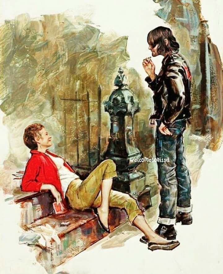 a man standing next to a woman sitting on a bench