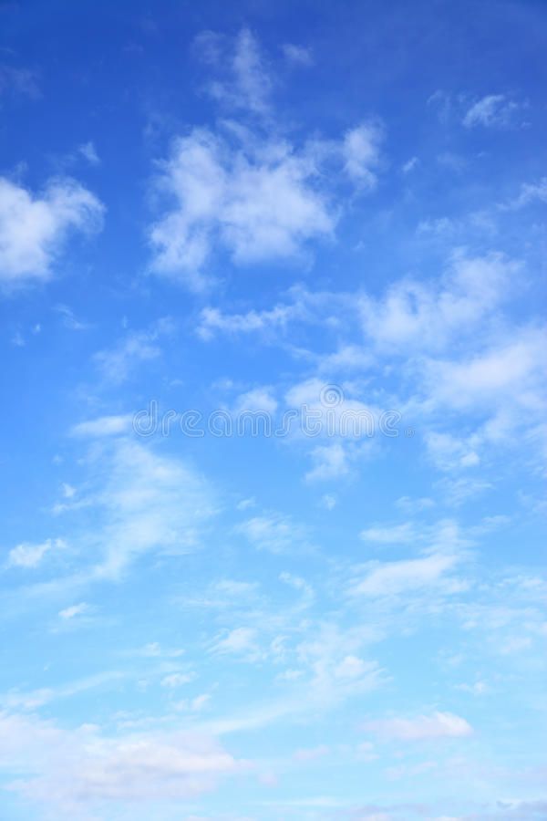 the blue sky with white clouds is shown in this image