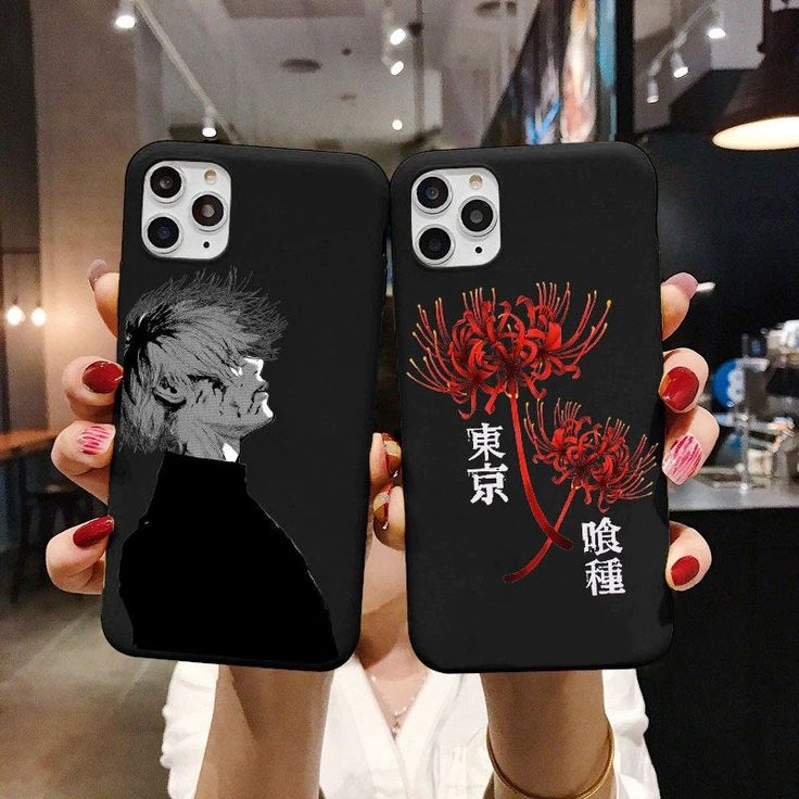 two people holding up their cell phones with anime artwork on the back and side cases