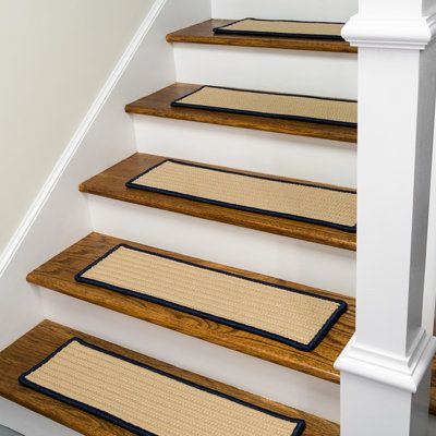 a set of stairs with carpeted treads on them