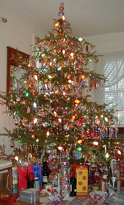 a decorated christmas tree in a living room