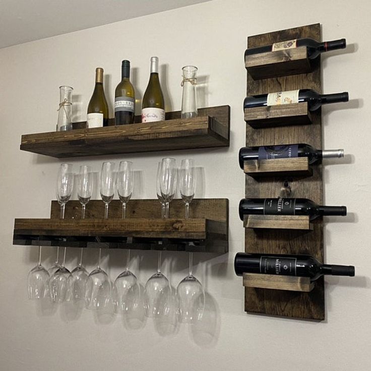 two wooden shelves holding wine glasses and bottles