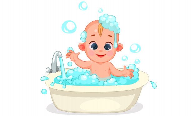 a baby is sitting in the bathtub with bubbles