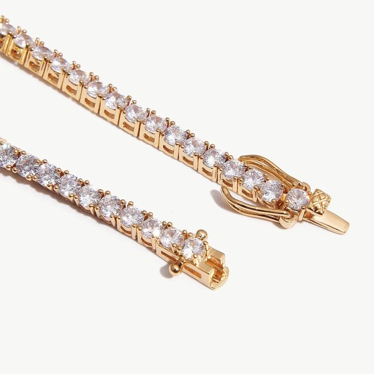 DetailsWidth: 3mmLength: 6 inchesWeight: 9.4gMaterialsMetal: Thick 18k Gold Plated on BrassGemstone: Cubic Zirconia💝ProductsAdd a touch of sophistication to your look with this delicate 3mm tennis bracelet in a beautiful gold color. Made with attention to detail. this bracelet is perfect for those who prefer a more subtle and understated accessory. Wear it alone or stack it with other bracelets for a chic and stylish look. 💙Item HighlightsAt the heart of this accessory lies our commitment to q Elegant Adjustable Gold-plated Tennis Bracelet, Elegant Adjustable Gold Plated Tennis Bracelet, Dainty Gold Tennis Bracelet For Formal Occasions, Elegant Gold Tennis Bracelet With Cubic Zirconia, Elegant Gold Cubic Zirconia Tennis Bracelet, Gold Dainty Tennis Bracelet With Prong Setting, Elegant Gold Plated Round Tennis Bracelet, Gold Cubic Zirconia Tennis Bracelet Hand Set, Delicate Gold Diamond Tennis Bracelet