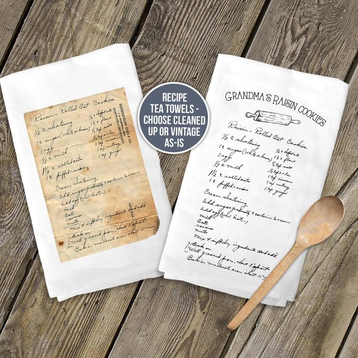 two tea towels with handwritten recipe on them and a wooden spoon next to it