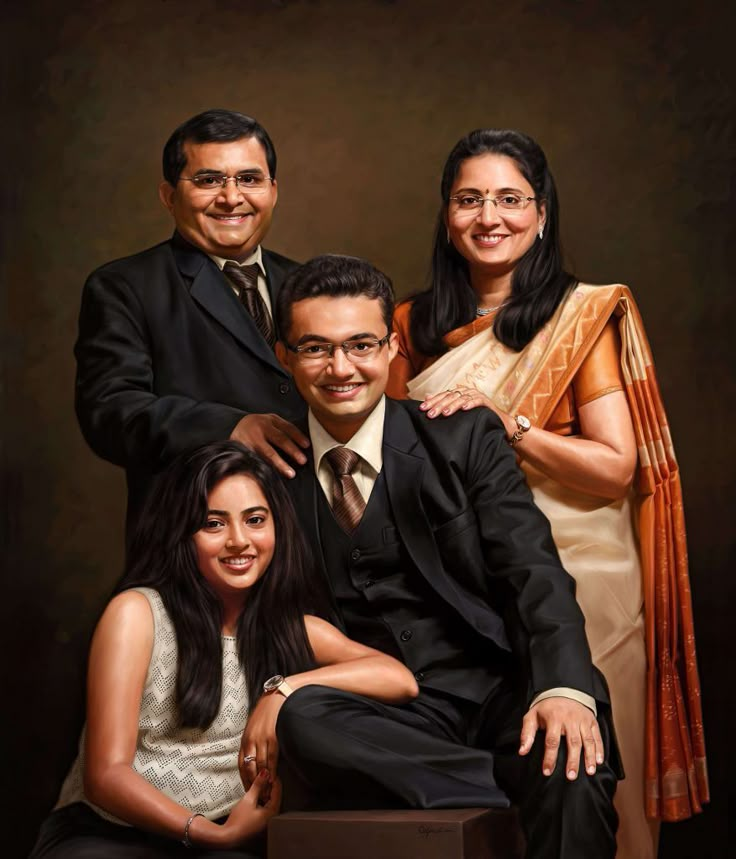 an image of a family posing for a photo in front of a dark background with the man and two women smiling at the camera