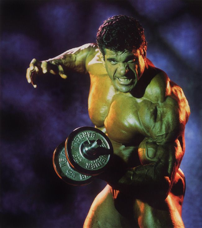 the incredible hulk is holding a barbell