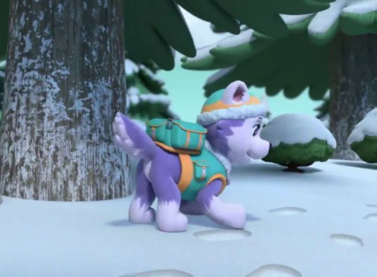 a small purple animal wearing a backpack in the snow