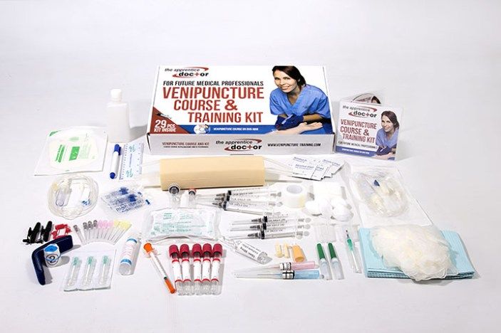 an assortment of medical supplies are laid out on a white surface, including gloves and other items