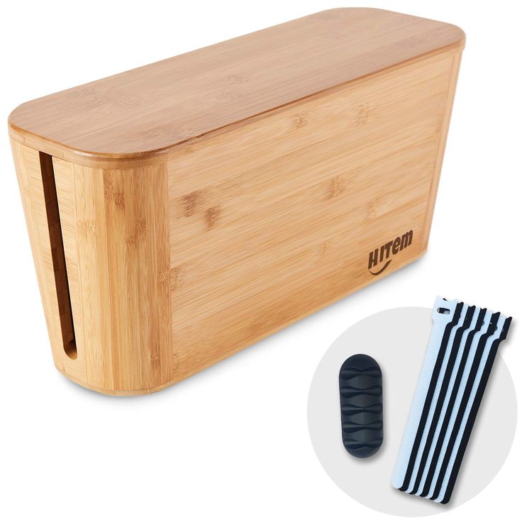 an image of a bamboo cutting board with two knives next to it and some black and white striped straws