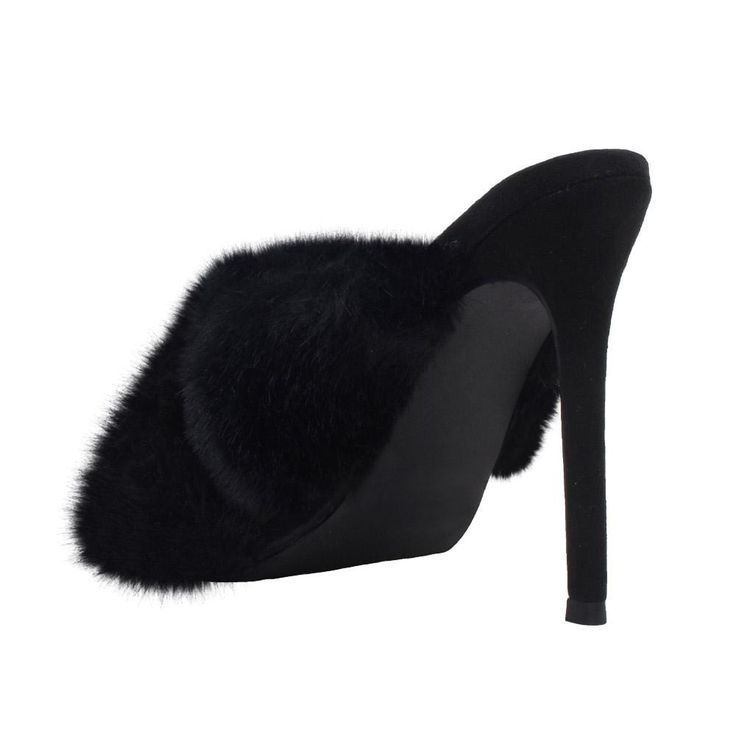 Faux fur embedded vegan suede upper Man made sole Slip-on styling Heel measures approx. 4.25" H Imported