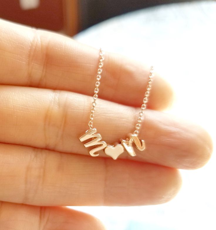 "A beautiful Rose Gold plated Letter and Heart Necklace personalized with your chosen Letter / shiny and minimalist ♡. If you need another color (gold, white gold) please just write a note when you check out. (note to seller box) This necklace has gift box. (individually) Details: - Materials used: Rose Gold plated Brass Chain, approx 5 mm shiny rose gold plated lowercase initials. - Necklace Length is 16\" If you need other length (13~20\") please just write a note when you check out. How to pu Dainty Clavicle Chain Name Necklace For Anniversary, Personalized Rose Gold Clavicle Chain Charm Necklace, Delicate Initial Necklace For Mother's Day Gift, Delicate Chain Initial Necklace For Mother's Day, Mother's Day Gift Initial Necklace With Delicate Chain, Personalized Delicate Chain Jewelry For Valentine's Day, Delicate Chain Jewelry For Valentine's Day Personalized Gift, Mother's Day Gift: Delicate Chain Initial Necklace, Rose Gold Initial Necklace For Valentine's Anniversary