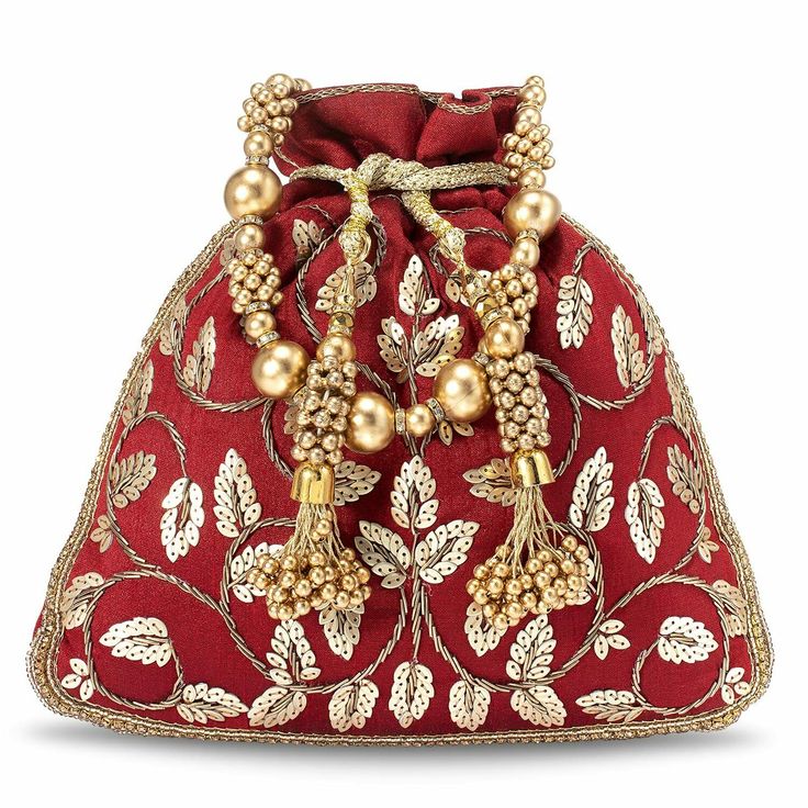 a red purse with gold beading and pearls